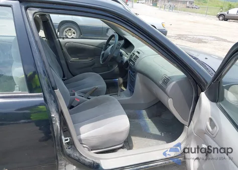 2002 Toyota Corolla Ce из США, поврежденный, VIN 2T1BR12E02C518874